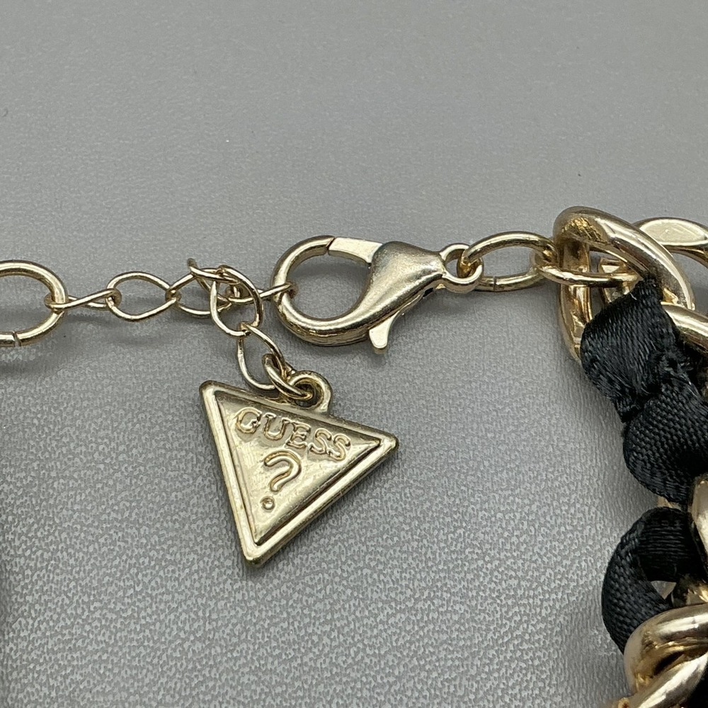 Guess Bracelet Gold Tone Black Enamel Crystal Spider Logo Charm‎ Womens Fashion - Picture 3 of 8